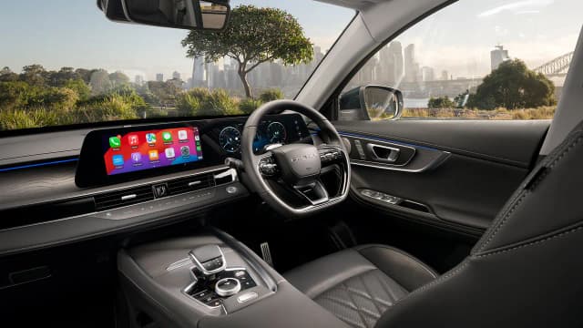 Chery Tiggo 8 Pro Max dashboard with curved twin screens, right-hand drive