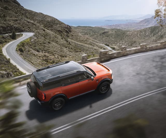 Ford Bronco Basecamp driving off-road