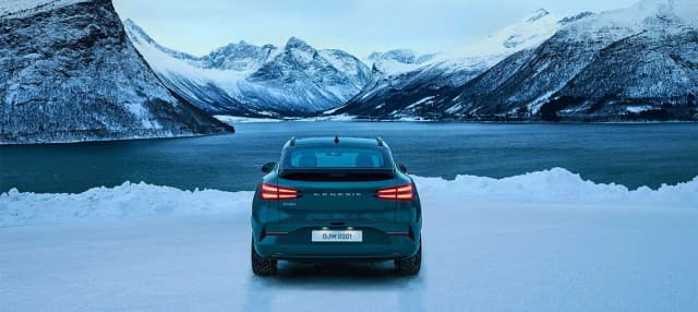 Genesis GV60 rear view on snow
