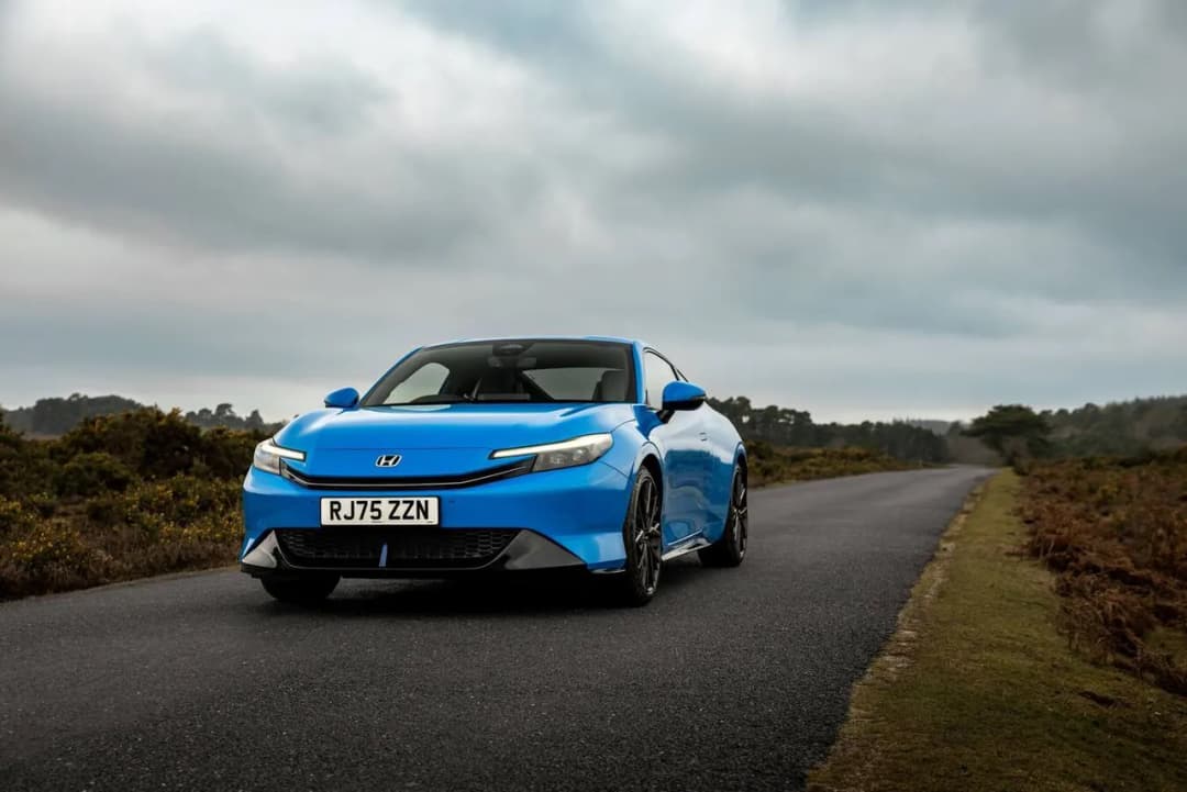 2026 Honda Prelude front view on a heathland road