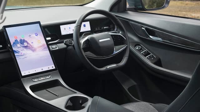 Jaecoo J5 dashboard with portrait touchscreen, right-hand drive