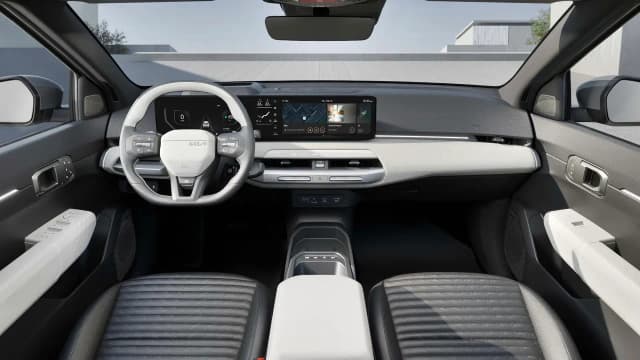 Kia EV4 right hand drive dashboard with panoramic display and two-spoke steering wheel