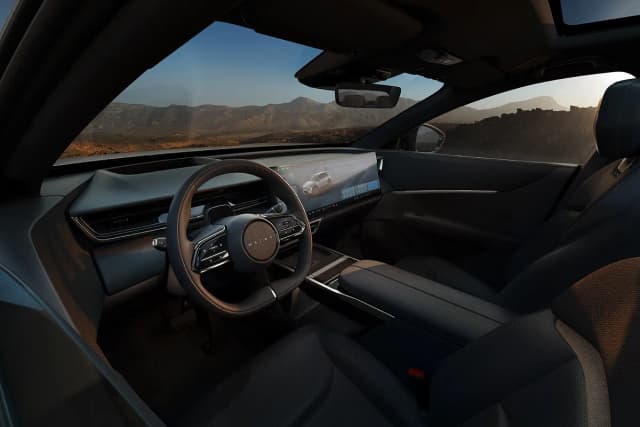 Mazda CX-6e dashboard with wide screen display and steering wheel
