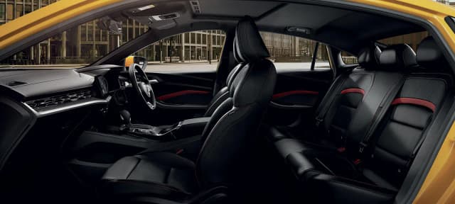 MG5 front cabin with red stitched sports seats