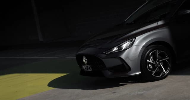 MG5 sedan in grey front end and headlight detail