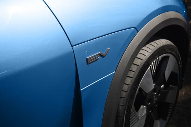 Mitsubishi ASX VR-e EV badge and slidable charge-port cover