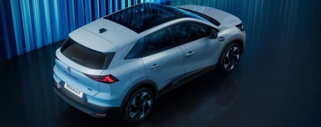 Renault Symbioz from a high rear angle showing the glass roof