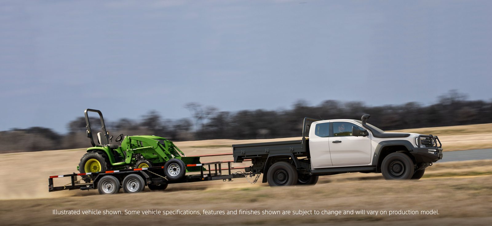 Ford Ranger Super Duty towing a tractor