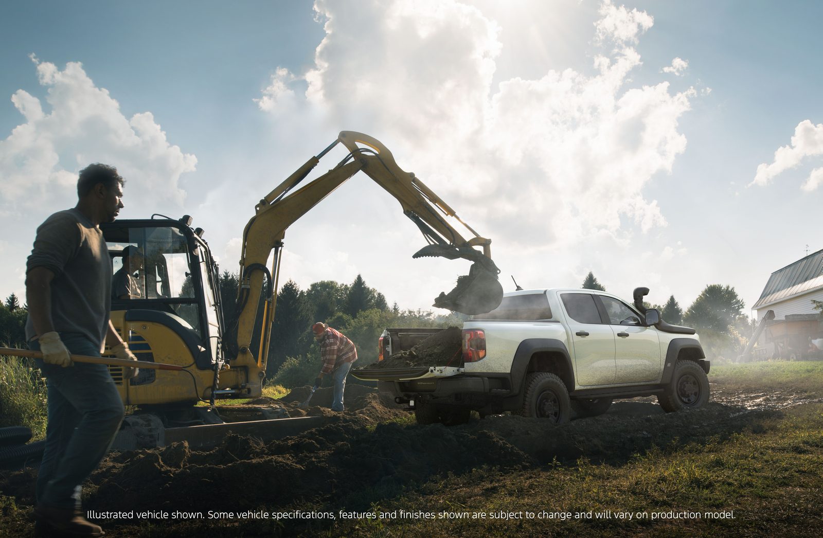 Excavator loading a Ford Ranger Super Duty